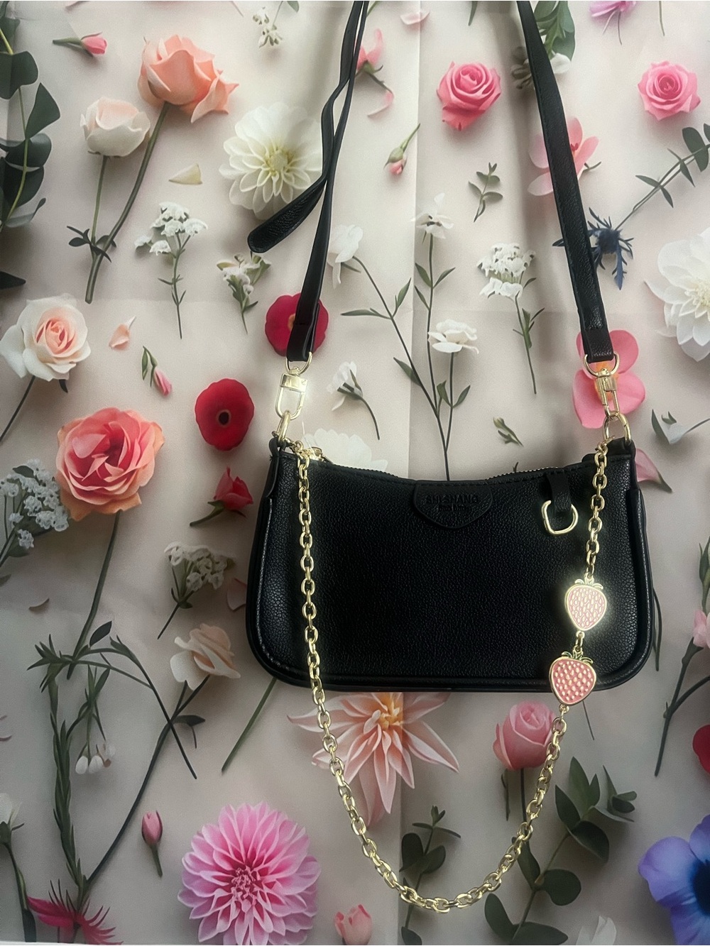 Black Women’s Shoulder Bag with Gold Chain and decorated with strawberries